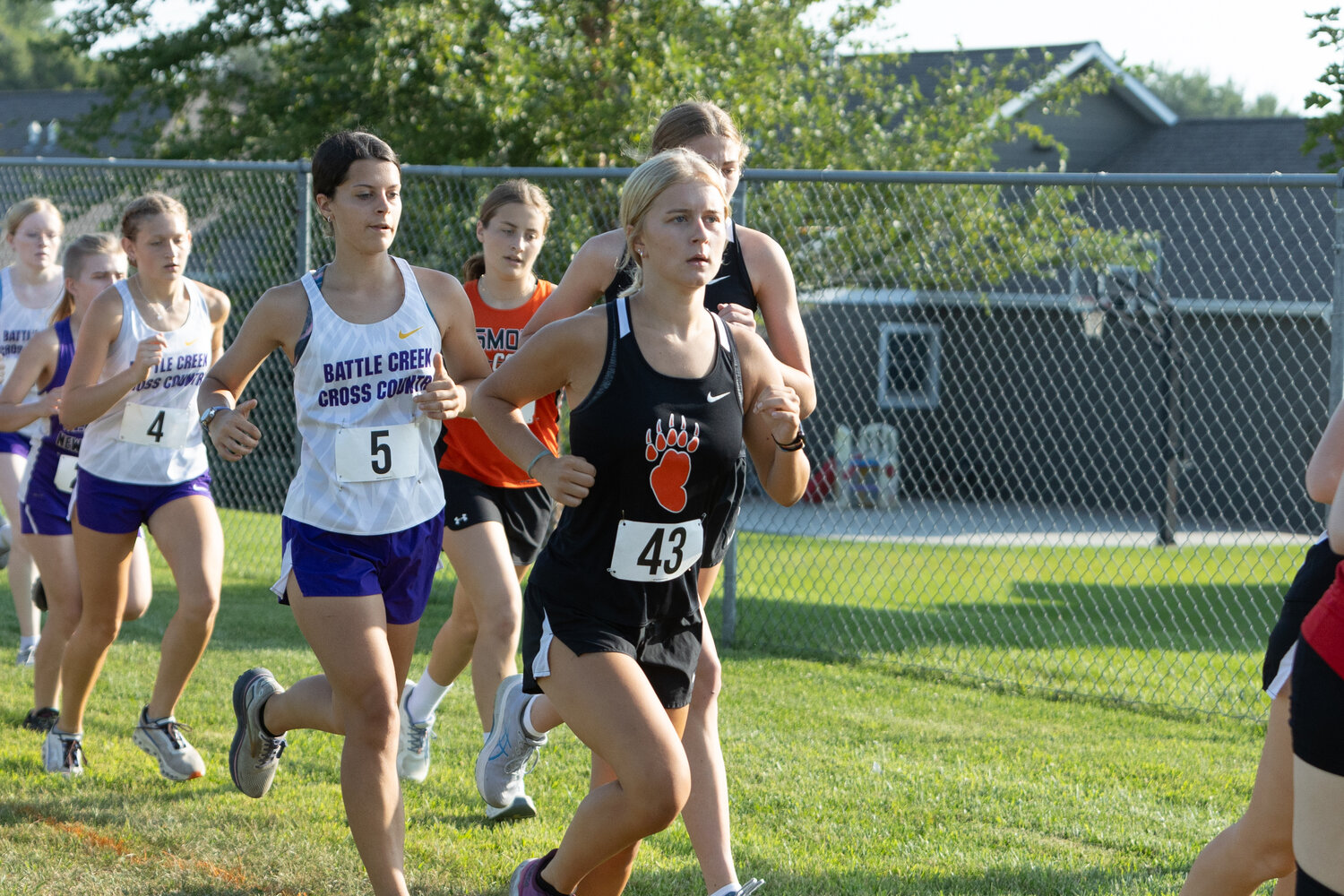 Kate Tasler runs for the LCC girls during the Hartington-Newcastle Invitational. She finished 23rd as the LCC girls placed fourth.