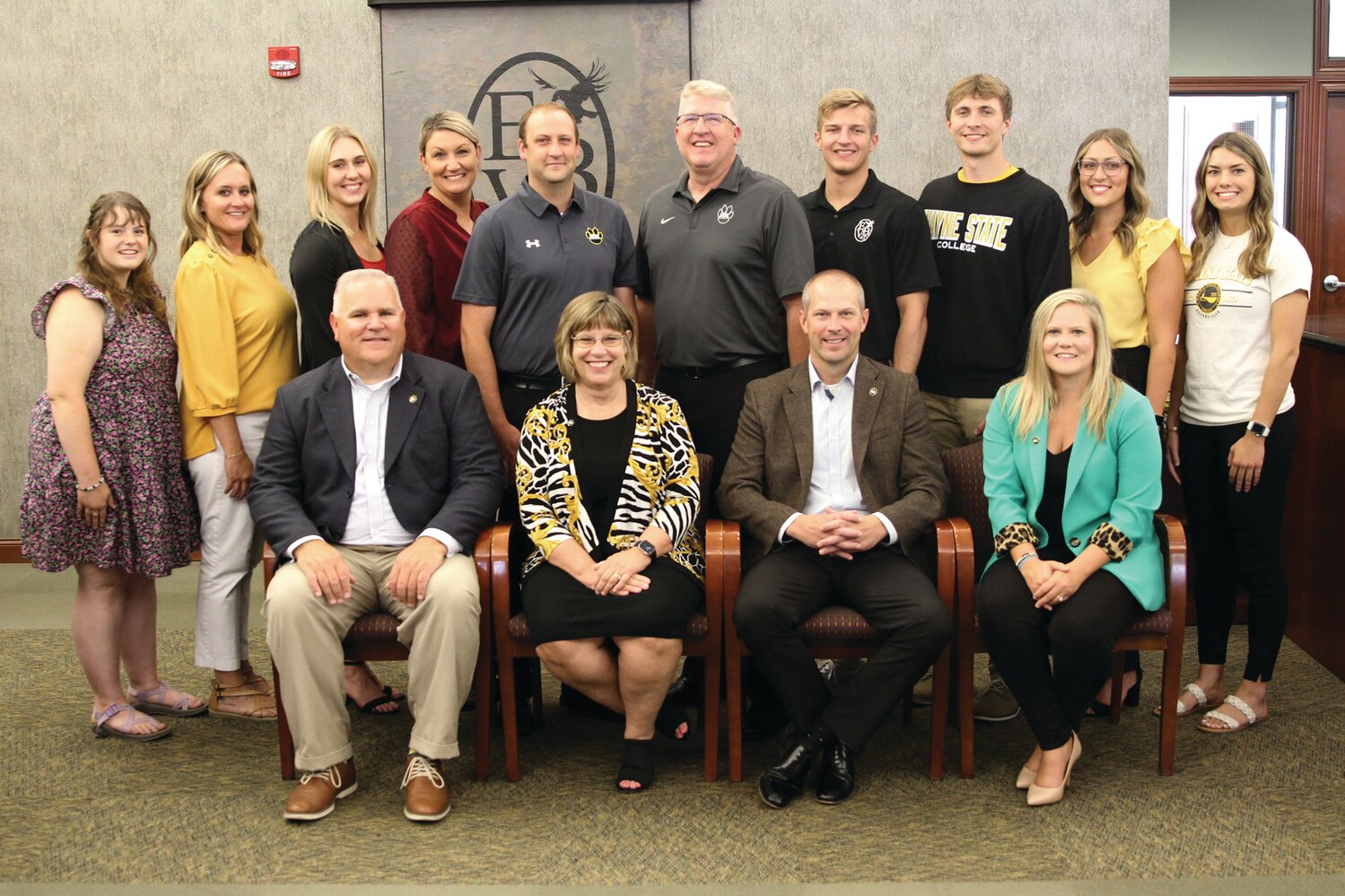 Elkhorn Valley Bank & Trust made a $100,000 to Wayne State’s Athletic and Recreation Complex Renovation and Addition project. Gathering to recognize the donation were: Wayne State representatives (front) Kevin Armstrong, Dr. Marysz Rames, Mike Powicki and Megan Finn. Wayne State alumni employed at Elkhorn Valley’s Wayne branch include (back) Brianna Campbell, Jamie Dunn, Ria Pedersen, Amanda Prince, Brandon Mainquist, Rod Hunke, Blake Bartos, Elijah Pfeifer, Megan Anderson and Gina Wragge. Not pictured from Elkhorn Valley Bank are Lincoln Havranek and Bri Robins.