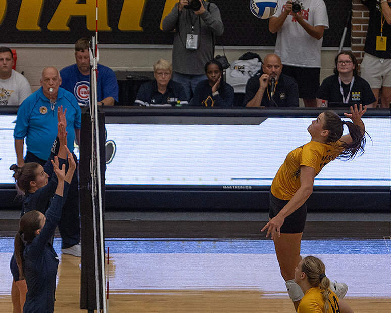 Taya Beller puts away one of her match-high 13 kills as No. 3-ranked Wayne State took down top-ranked Concordia-St. Paul in straight sets Friday at Rice Auditorium, 25-19, 28-26, 25-21. (Photo by Michael Carnes)